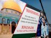 Cartaz na cidade de Hebron, na Cisjordânia ocupada, apelando a Messi para não participar no jogo amigável Argentina-Israel de preparação para o Mundial